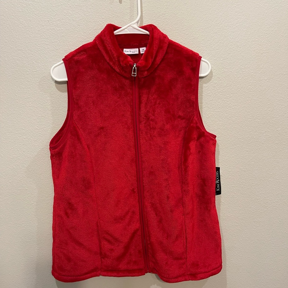 Kim Rogers red vest